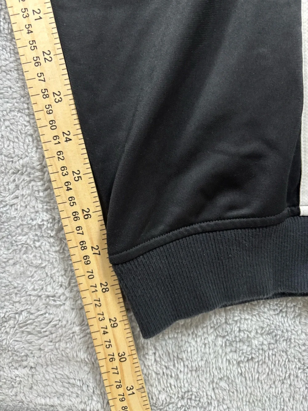 Adidas black track pants with white stripes